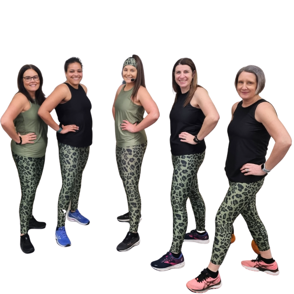 Five women wearing khaki green leopard print leggings and black tank tops on a white background