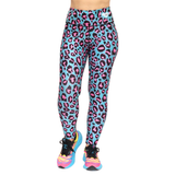 Leggings with pink leopard print on a blue background, worn with colourful trainers.
