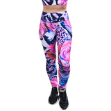 Colorful floral and animal print leggings on a white background