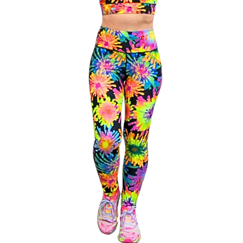 Colourful neon floral patterned leggings leggings on a white background, front view