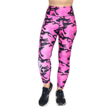 Pink camouflage leggings worn by a person on a white background