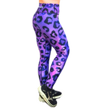 Purple and black leopard print leggings worn by a person on a white background