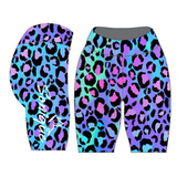 Blue, purple, pink and black leopard print shorts on a white background