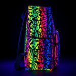 Backpack with colorful leopard print pattern on a black background