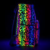 Backpack with colorful leopard print pattern on a black background
