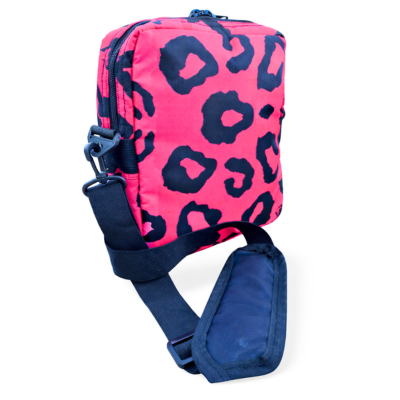 Pink bag with black leopard print and blue strap on a white background