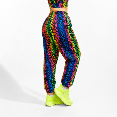Colourful animal print jogger pants with a white background