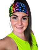 Bright coloured headband on a woman in a neon yellow vest