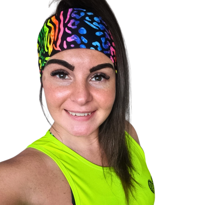 Bright coloured headband on a woman in a neon yellow vest