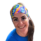 woman wearing rainbow colourful headband on a white background
