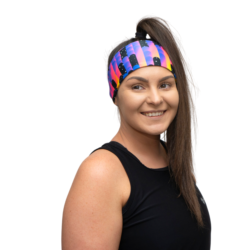 woman in bright neon headband on a white background