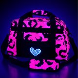 Pink and black animal print patterned holdall bag with a blue heart design on a dark background