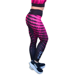 Black and pink patterned leggings with white text on a white background