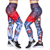 Christmas Leggings showing the side view left and right legs featuring  red skies, golden stars, white snowflakes and a snowy scene on the lower leg with frosty trees, a snowman and lantern on a model wearing black trainers.