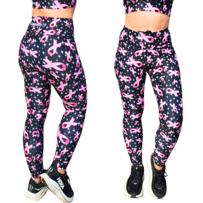 Leggings with pink ribbon pattern on a black background