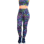 Multicolored star-patterned leggings with a matching top on a white background