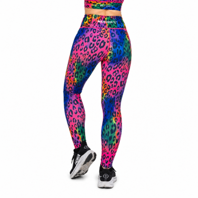 A person shown from the back wearing bright neon leopard-print leggings with rainbow color transitions and black athletic shoes, on a plain white background.