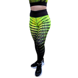 Neon yellow and black patterned leggings worn by a person on a white background