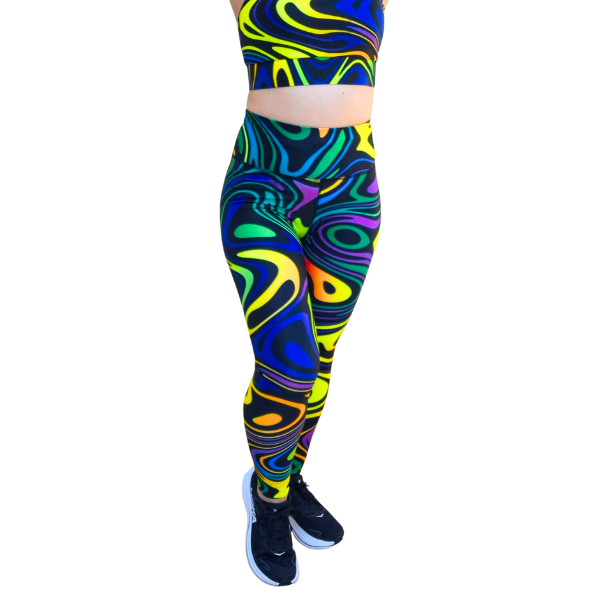 Colourful abstract, swirl-patterned leggings worn by a person on a white background