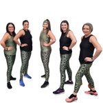 Five women wearing khaki green leopard print leggings and black tank tops on a white background