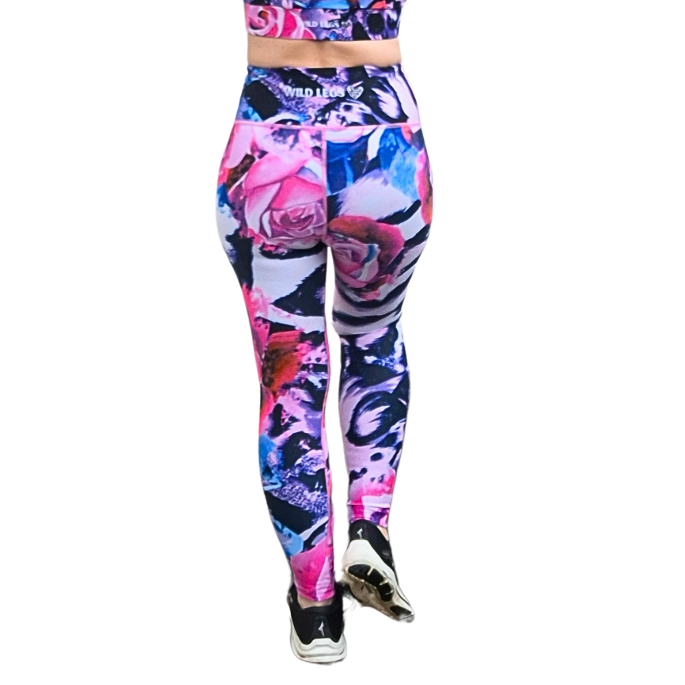 Colorful floral leggings with a white background