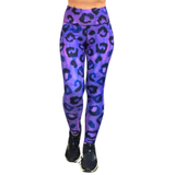 Purple and black leopard print leggings worn by a person on white background