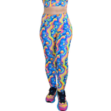 Colorful leggings with a vibrant pattern on a white background