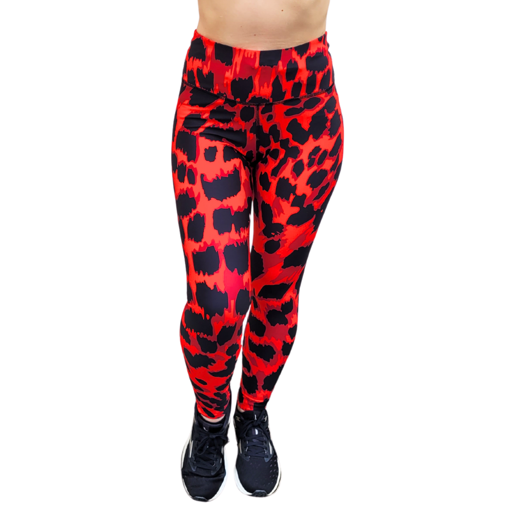 Red leggings with black leopard print pattern on a white background