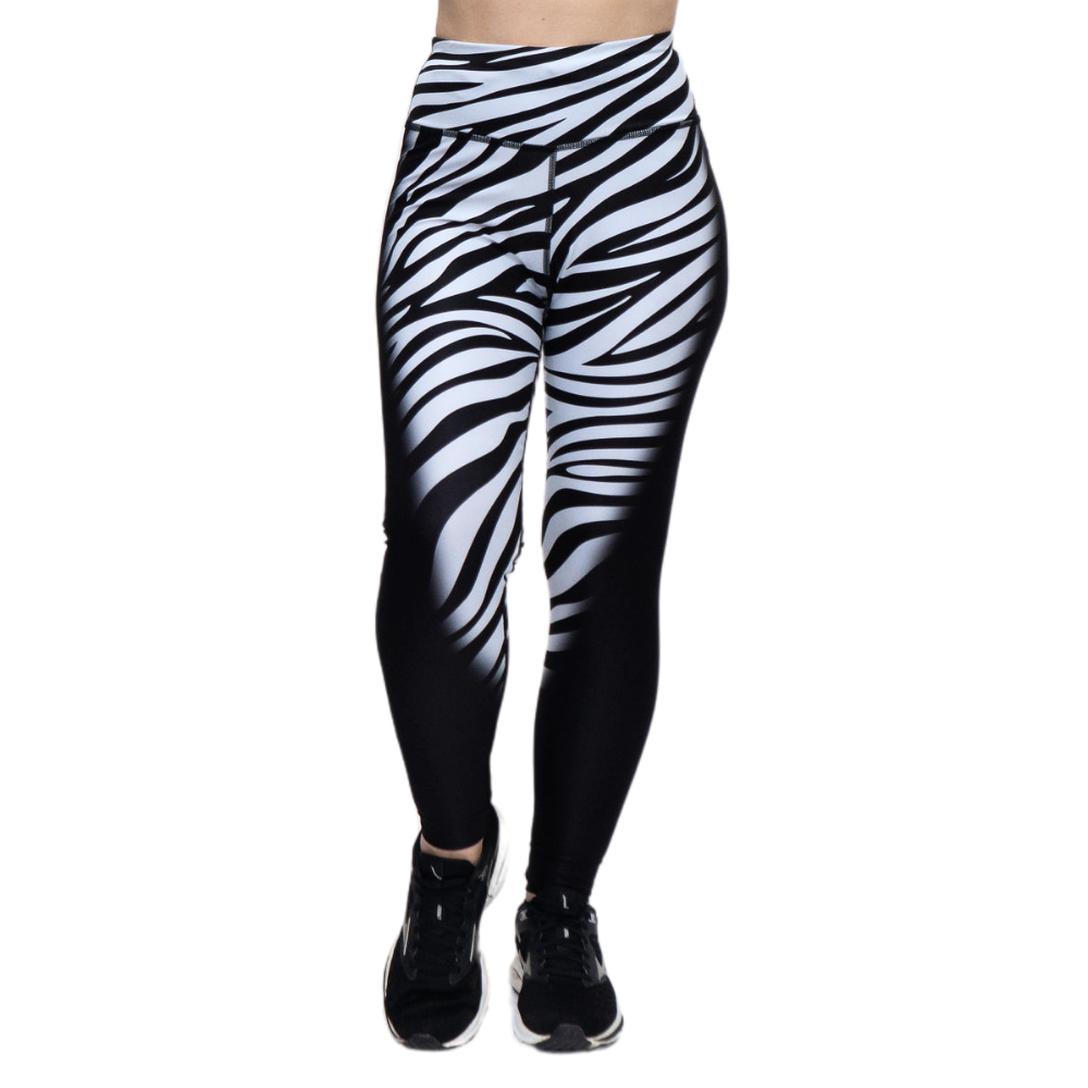 Black and white zebra print leggings on a white background