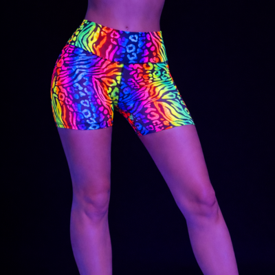 Multicolored zebra print shorts on a black background