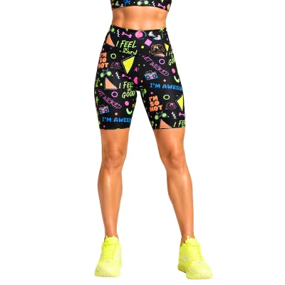 Person wearing colourful patterned Retro Slogan shorts on a white background