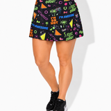 90s vibes neon slogans on a black skort worn by a person on a white background