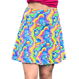 Bright, rainbow coloured skort on a white background
