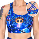 Blue Festive Sports Bra, showing the back inset in a an oval frame with the logo Wild Legs