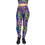 Colorful zebra print leggings with a white background