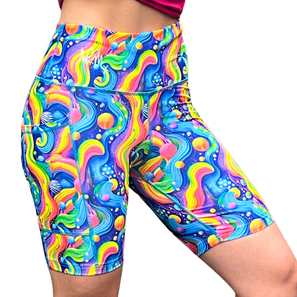 mid length colourful rainbow fitness shorts on a white background
