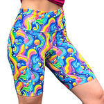 mid length colourful rainbow fitness shorts on a white background
