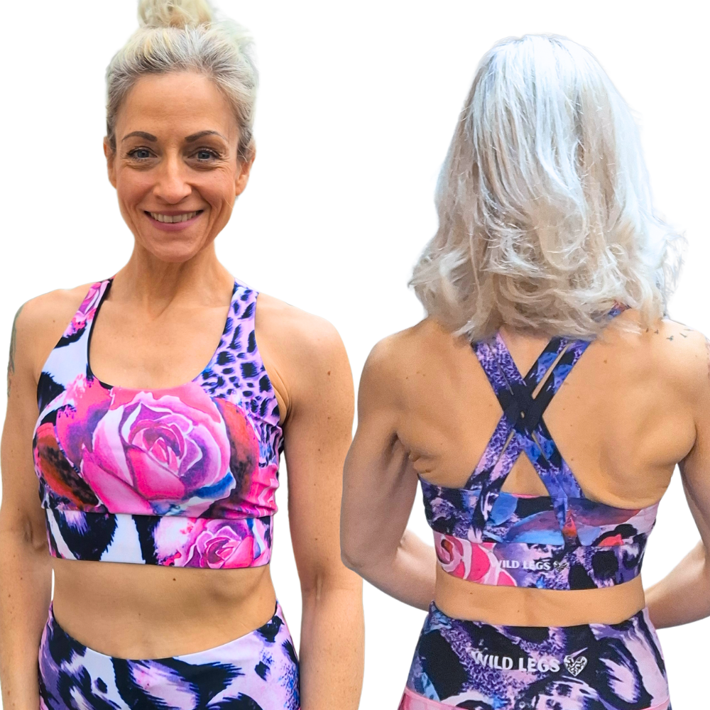 Woman wearing a pink floral and animal print design sports bra, shown from the front and the back