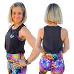 Woman wearing a black tank top and colorful tie-dye leggings, showing front and back views.